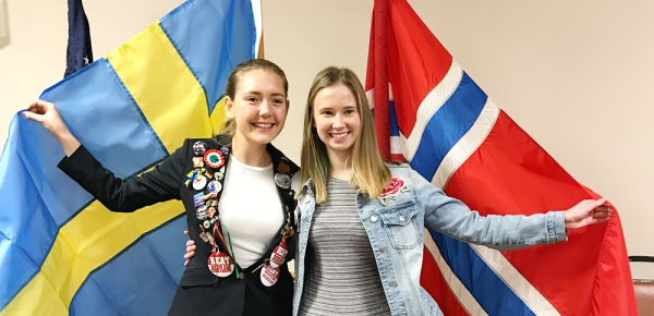 Scandinavian students with their home country flags