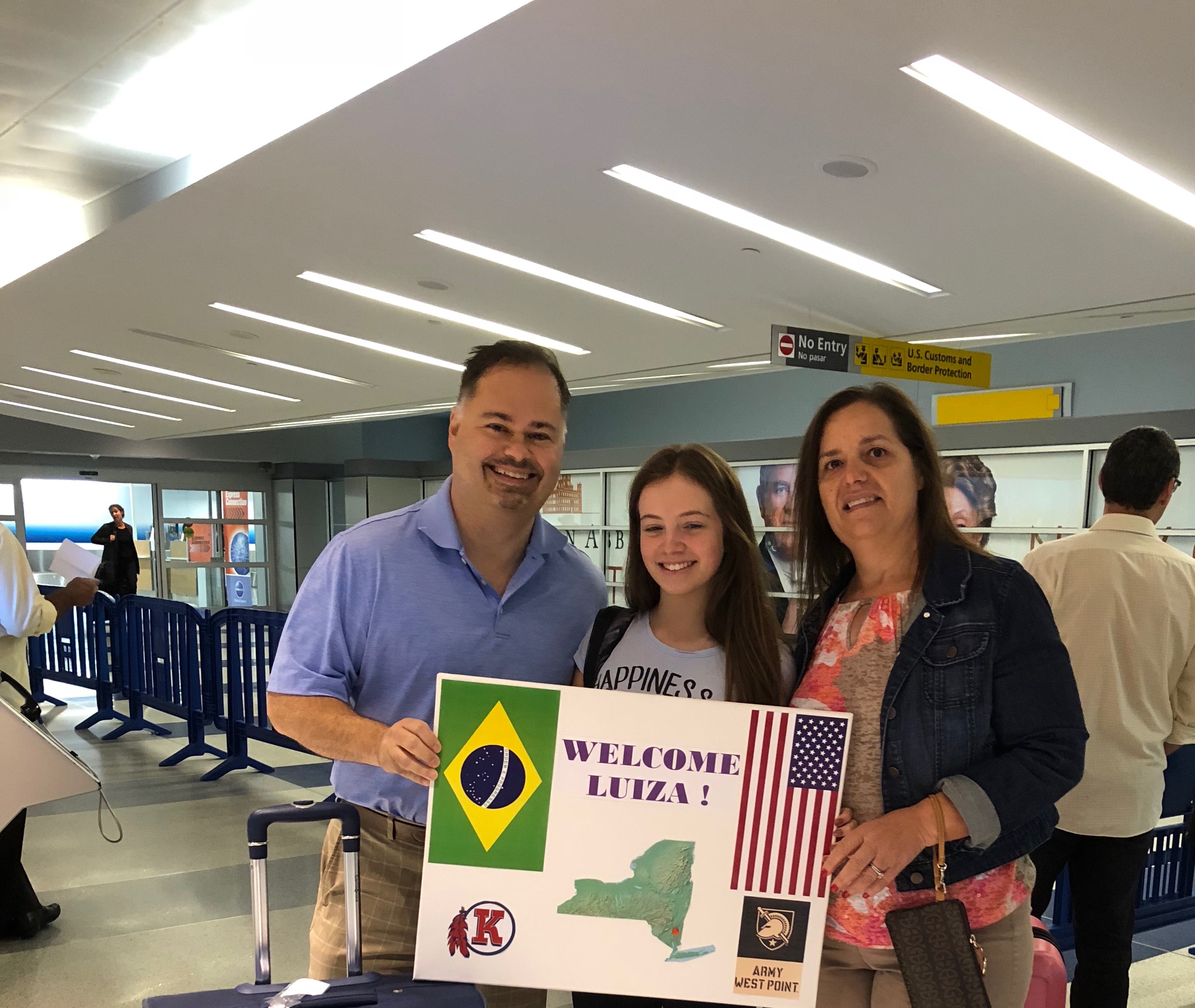 John Maria and Luiza at airport