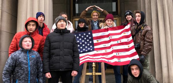 Students with an American flag