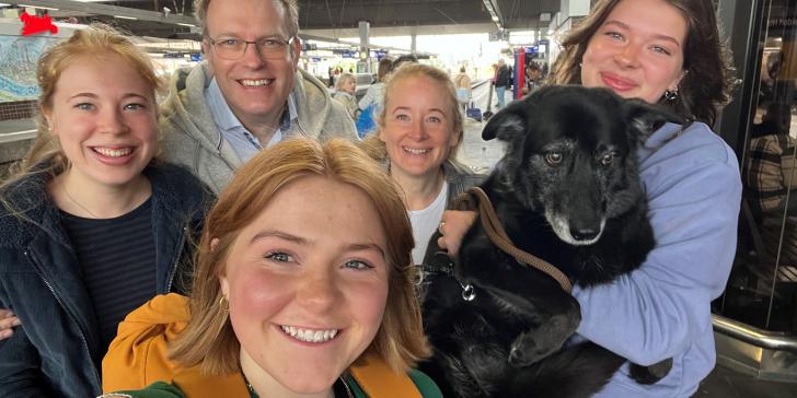 Train station farewell with long-term host family