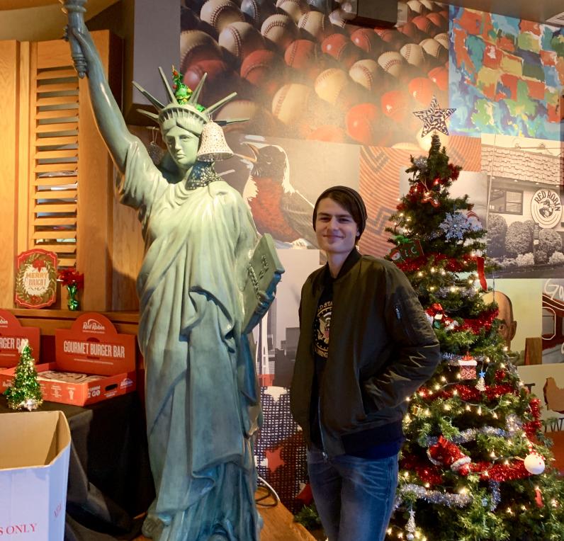 Student at mini statue of liberty